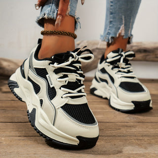 Women's elevated platform sneakers, white, with a thick sole for comfortable, fashionable style.