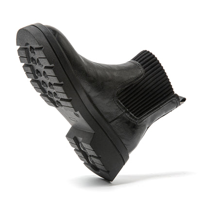 Stylish women's short brown boots, flexible design for versatile fashion.