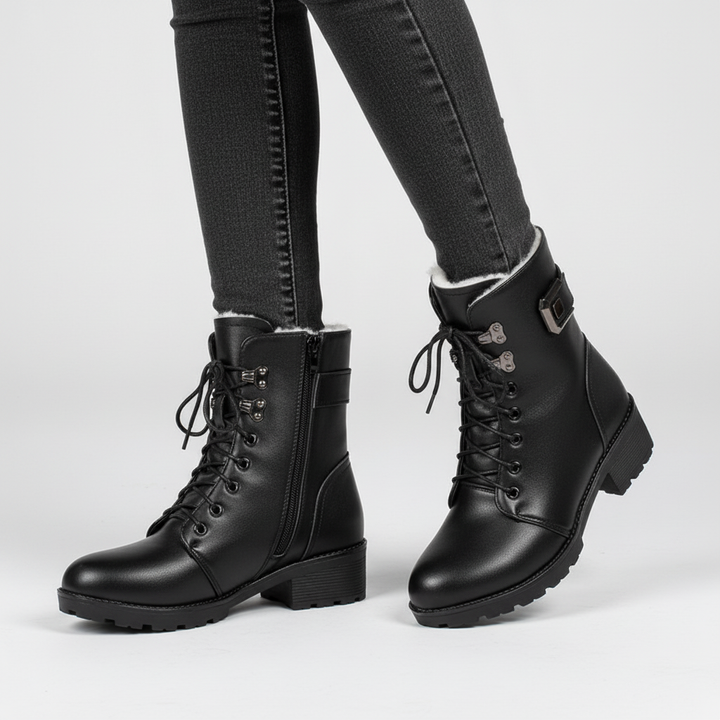 Stylish women's Elisa winter boots, wool-lined for warmth, with black PU leather finish