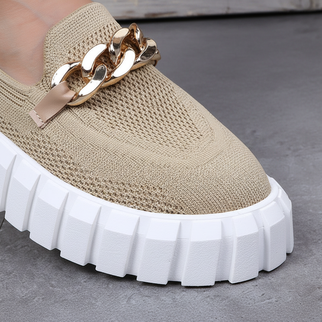 Comfortable women's slip-on sneakers with mesh upper, perfect as lightweight athletic shoes.