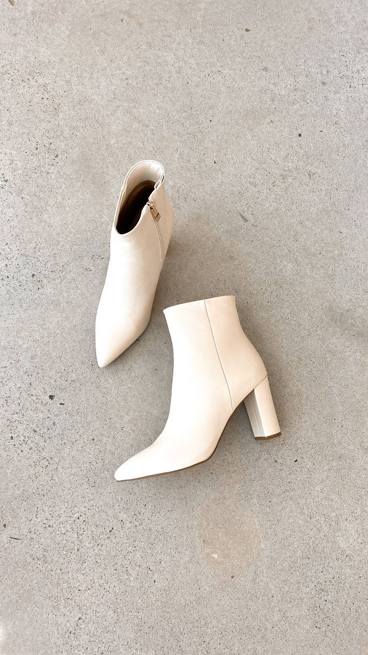 Ladies fashion footwear: Elonette pointed toe ankle boots, featuring a comfortable block heel.