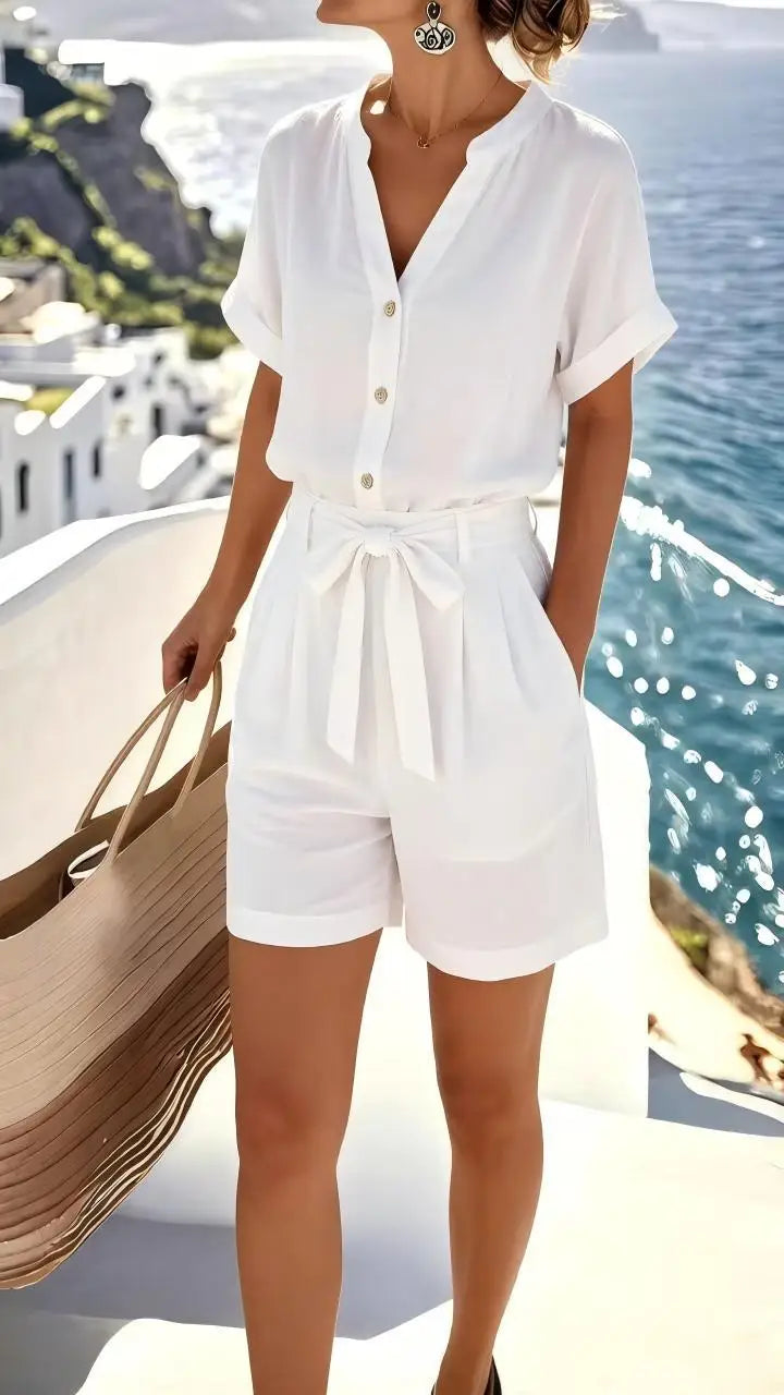Comfortable women's sleeveless romper, ideal for summer playsuits & vacation outfits. Chic tie-front design.