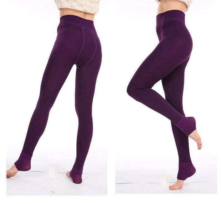 Active women's Elsa fleece-lined winter leggings, offering warmth & flexibility for cold weather activities.