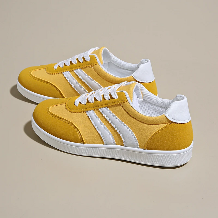 Elsa women's retro sneakers, inspired by 80s fashion. Comfortable vintage street style footwear.