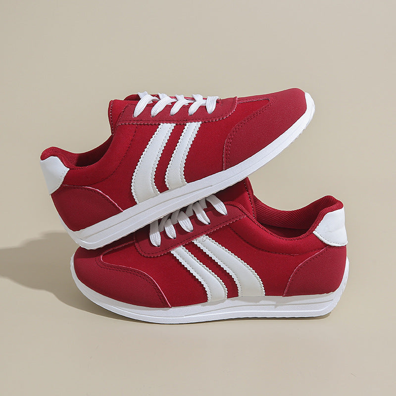 Elsa women's vintage sneakers, blending retro style & modern comfort. Classic casual footwear.