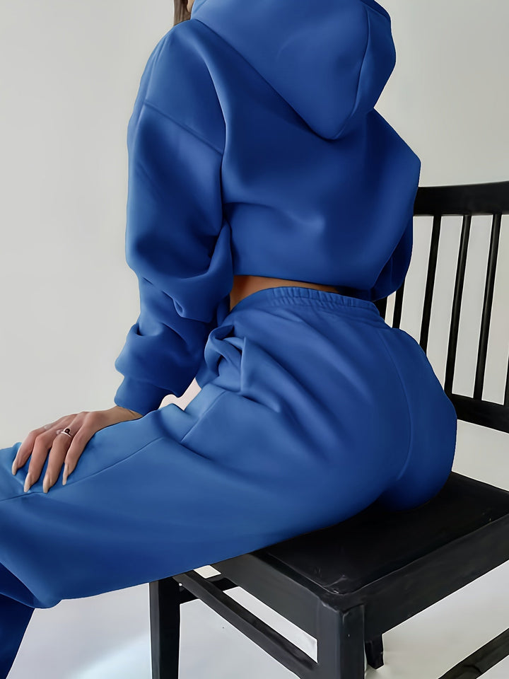 Stylish Elvira women's two-piece set. Casual letter print hooded sweatshirt with matching soft, relaxed-fit pants.