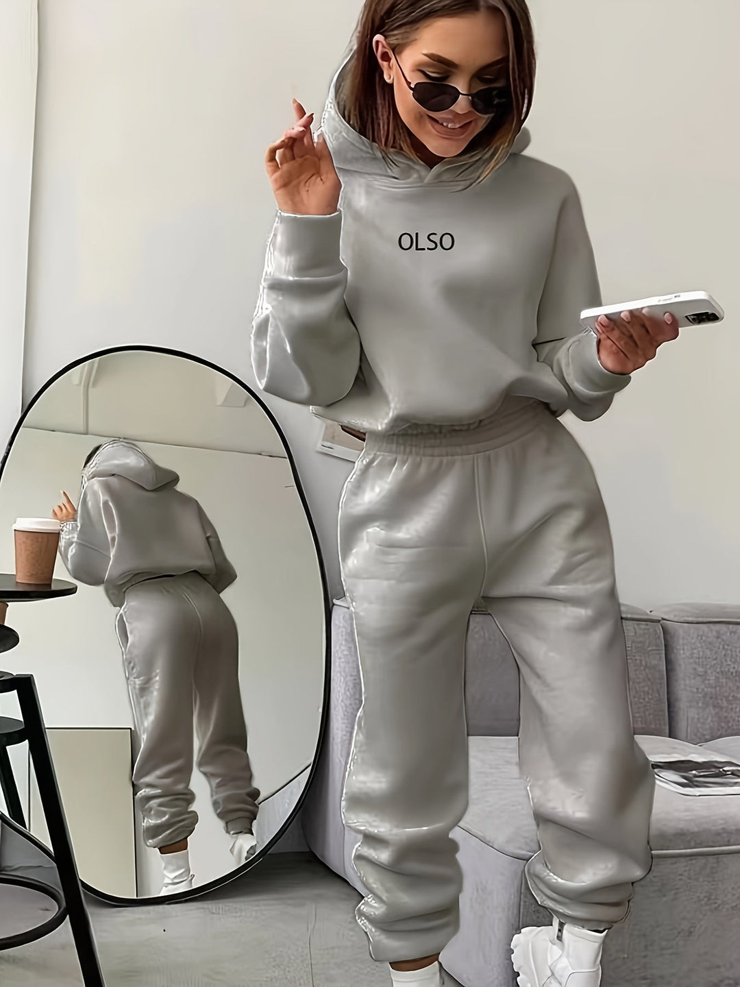 Elvira women's comfy two-piece set, featuring a casual letter print, hooded sweatshirt, and soft, relaxed-fit pants.