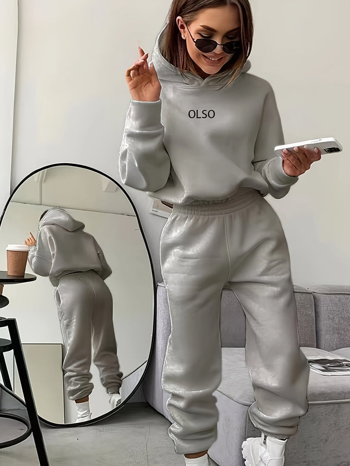 Elvira women's comfy two-piece set, featuring a casual letter print, hooded sweatshirt, and soft, relaxed-fit pants.