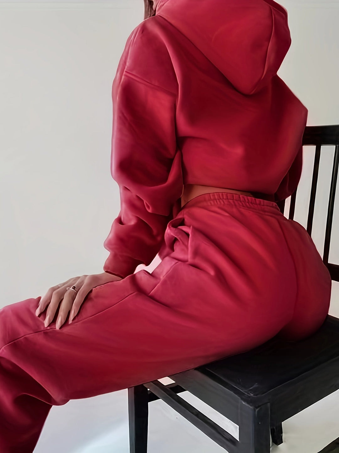 Elvira women's casual letter print two-piece set. Soft hooded top and comfy pants for a relaxed everyday look.