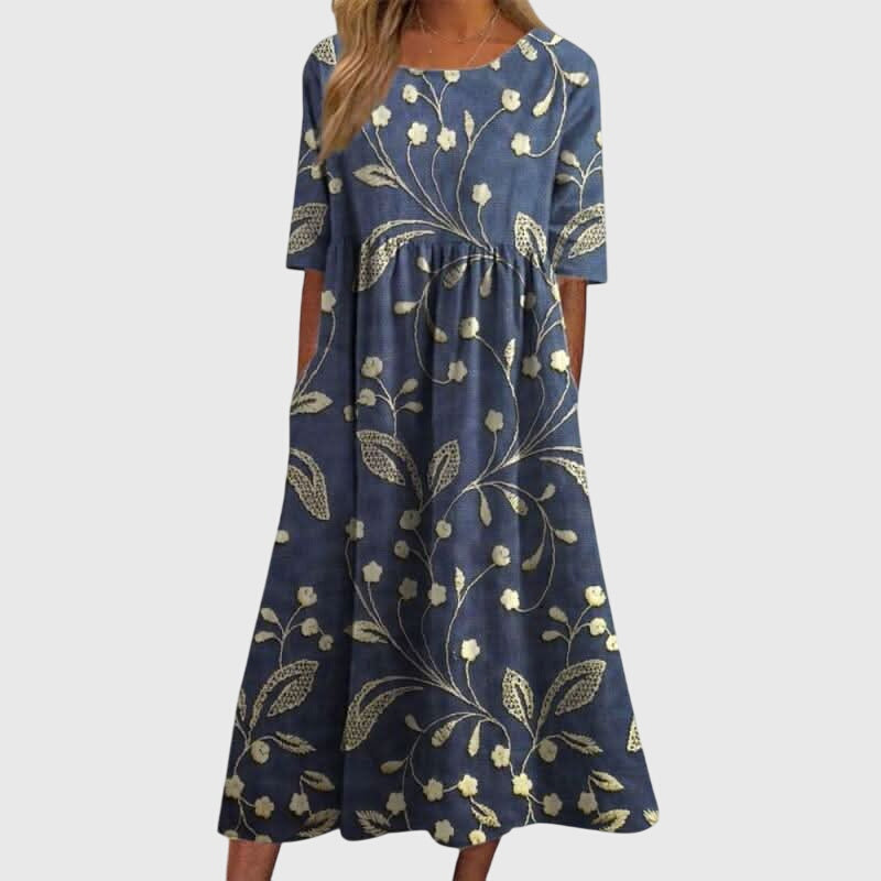Women's embroidered flowy midi dress in vibrant multi-color, perfect for summer casual or elegant wear.