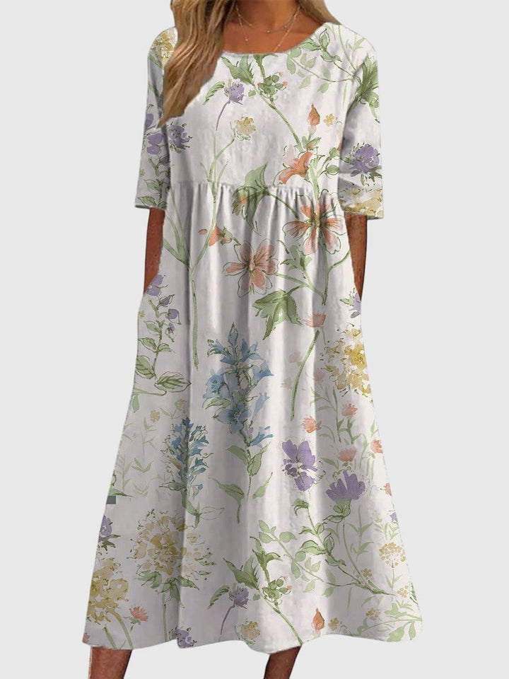 Casual summer embroidered midi dress for women, offering a graceful flowy silhouette in various colors.