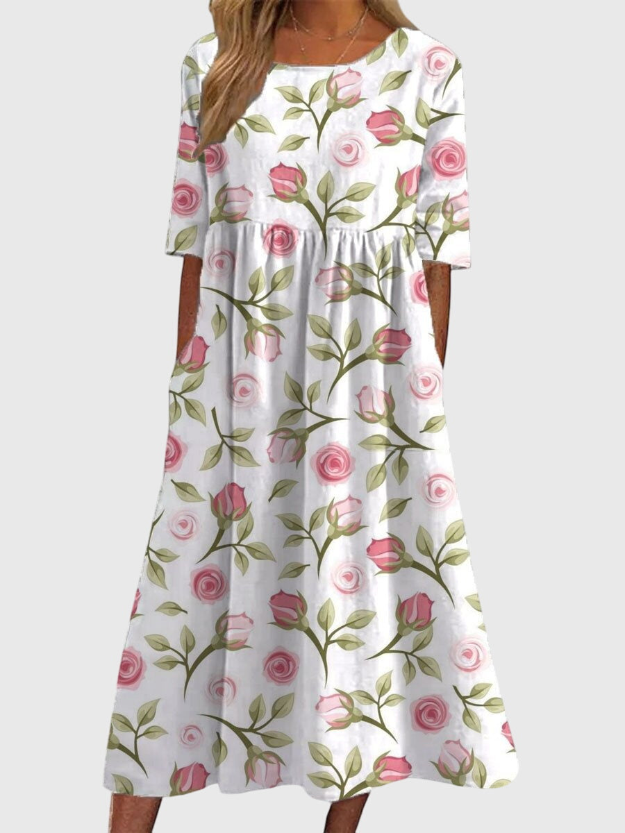 Stylish women's embroidered flowy midi dress in a multi-color design, ideal for summer fashion.