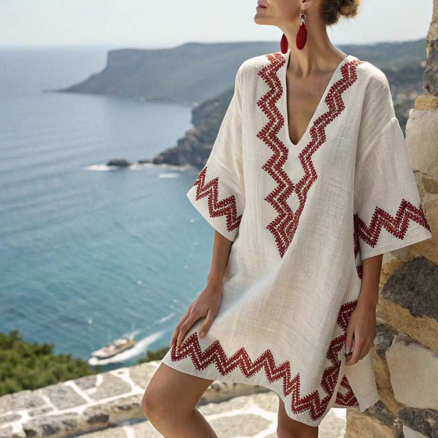 Women's embroidered kimono tunic dress for beach holidays, resort wear, or a stylish summer vacation.