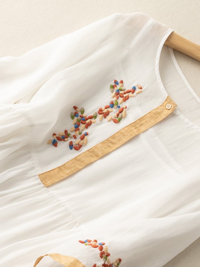 Soft, comfortable women's loose fit dress. Elegant embroidery, round neck & mid-sleeves for a relaxed vibe.