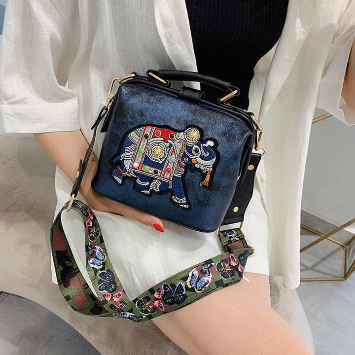 Versatile embroidered mandala shoulder bag, shown as a crossbody and shoulder carry, lightweight design