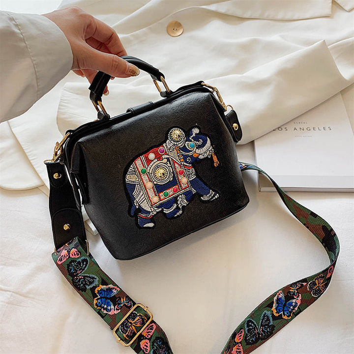 Embroidered mandala pattern on a women's lightweight shoulder bag, ideal for travel and daily adventures