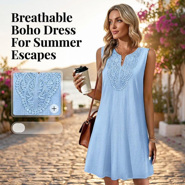 Elegant women's embroidered V-neck sleeveless dress, flowing midi style for summer or vacation.
