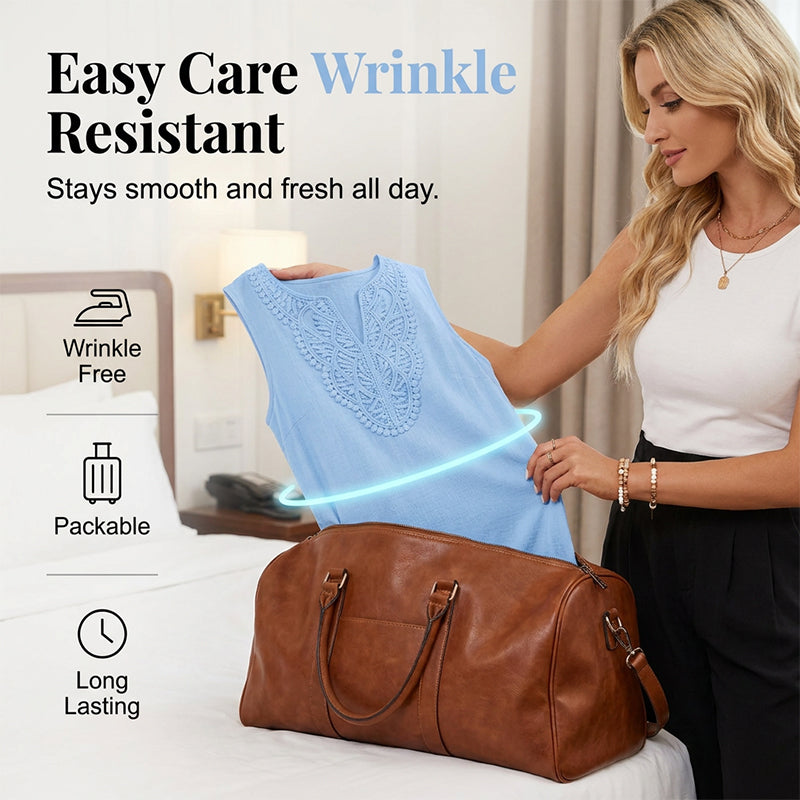 Casual women's embroidered sleeveless V-neck dress, a flowing midi style for warm summer days.