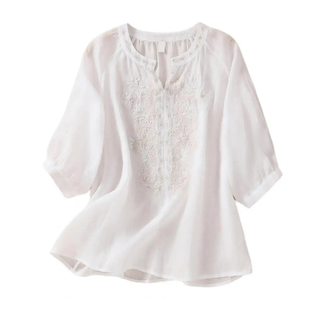 Boho floral embroidered women's top, loose fit, three-quarter sleeves & round neck for comfortable summer style.