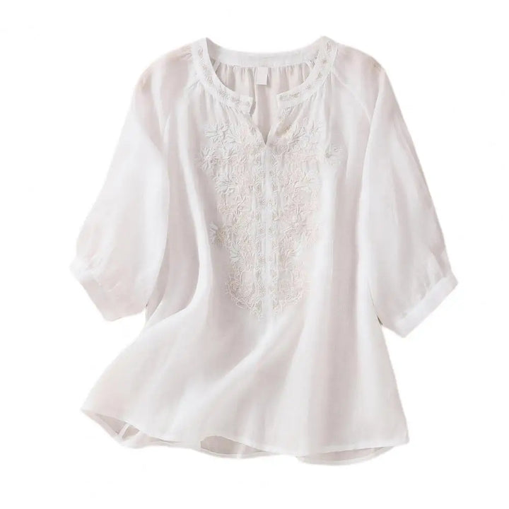 Boho floral embroidered women's top, loose fit, three-quarter sleeves & round neck for comfortable summer style.