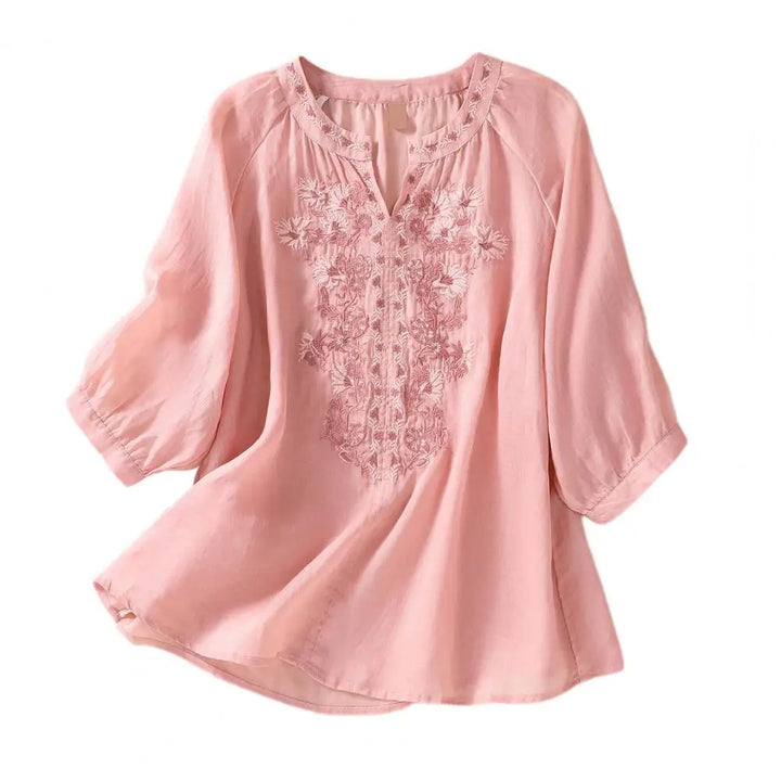 Ysolde women's loose fit summer blouse, embroidered with vibrant floral patterns, ideal for casual boho fashion.