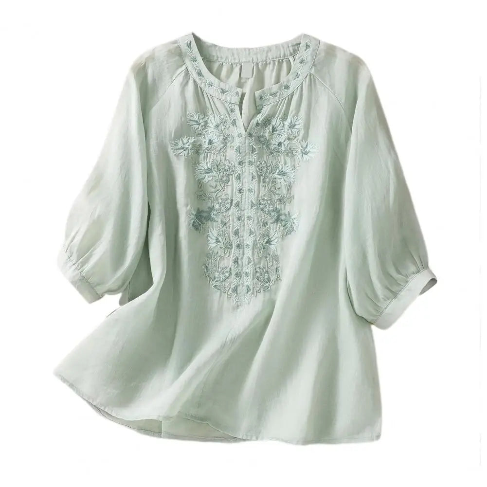 Embroidered women's summer top, boho floral design, three-quarter sleeves. Versatile for daily wear or holidays.