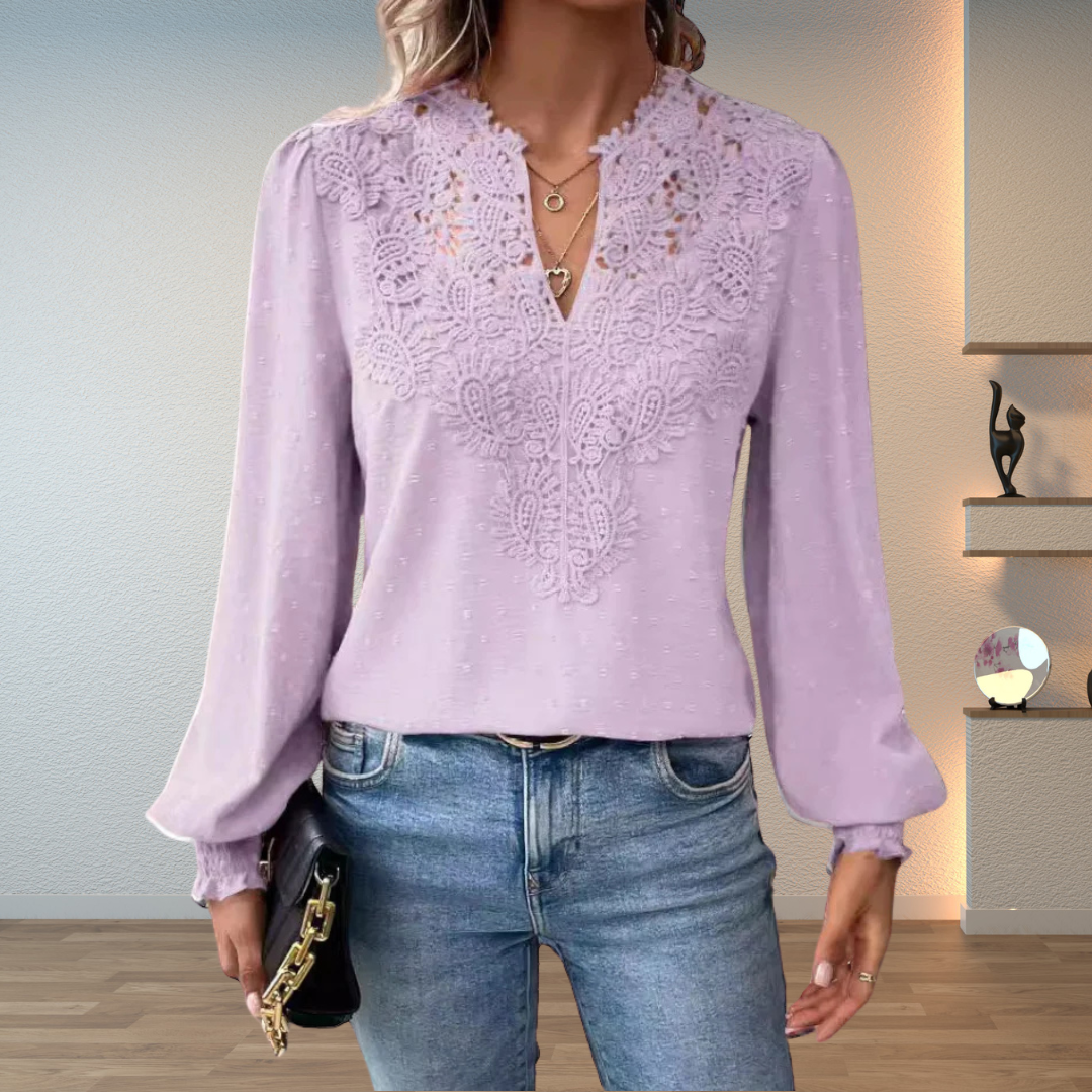 Delicate floral embroidered V-neck blouse for women, long puff sleeves, elegant design.