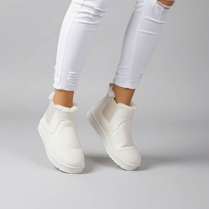 Stylish women's thermal slip-on boots, perfect for warm winter fashion footwear