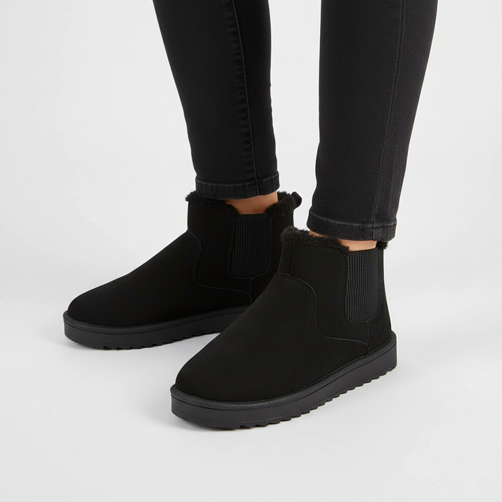 Durable women's thermal slip-on winter boots with cozy lining for outdoor adventures