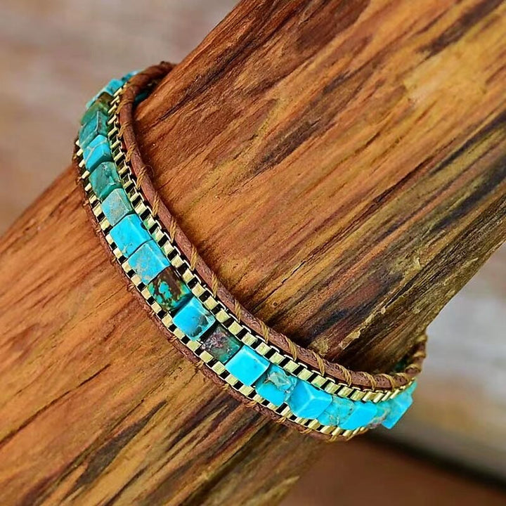 Boho-chic women's turquoise bracelet with emperor stone beads, a stylish jewelry accessory for any outfit.