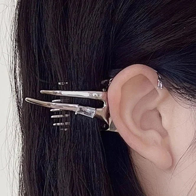 Women's enchanting elf wing silver dangle earrings. Unique fantasy jewelry for a mystical touch.