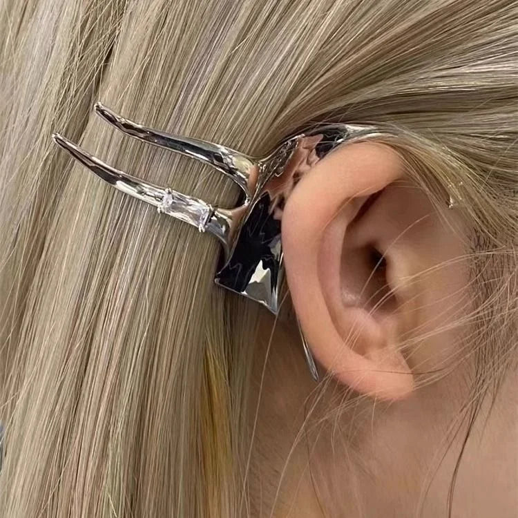 Chic women's silver fairy wing earrings. Mystical fantasy jewelry, perfect for elegant elven style.