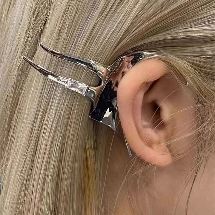 Chic women's silver fairy wing earrings. Mystical fantasy jewelry, perfect for elegant elven style.