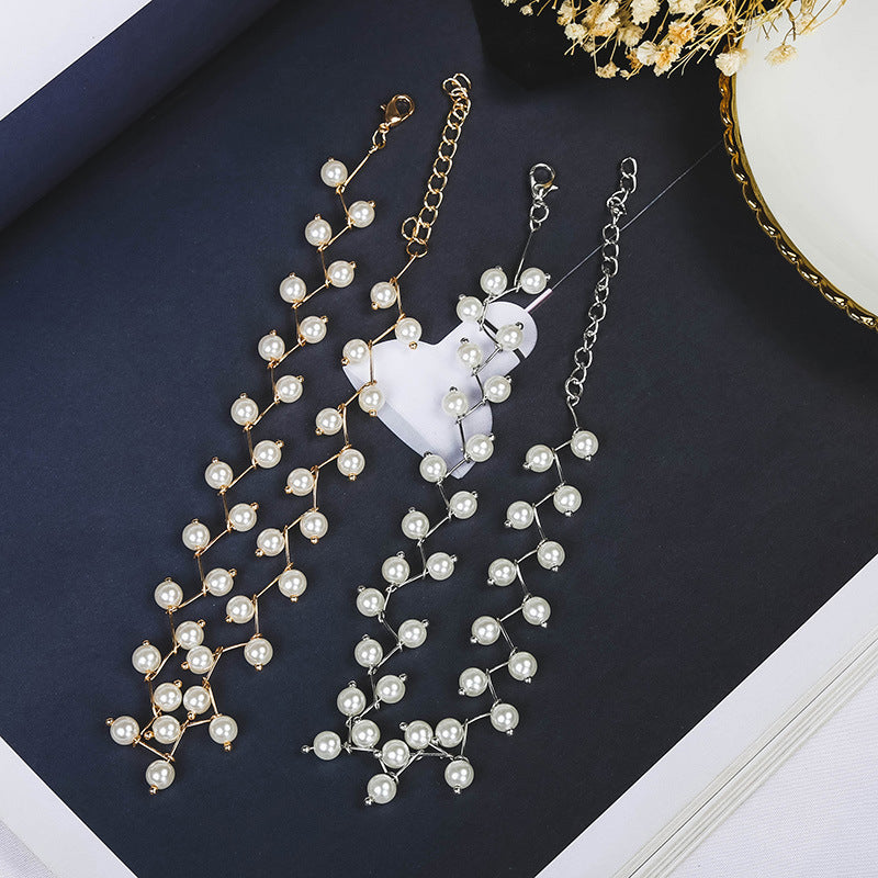 Whimsical women's gold fairy necklace, elegant pendant jewelry, delicate magical design.