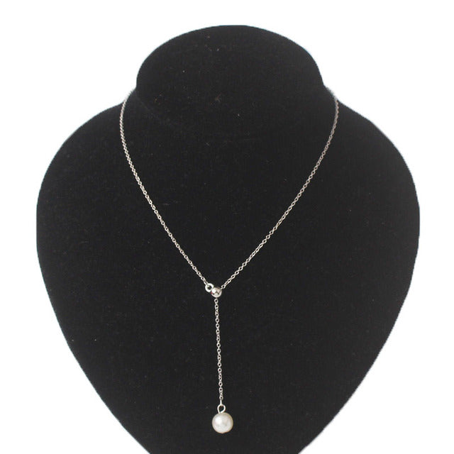 Magical fairy charm necklace for women, silver, unique and elegant jewelry piece.