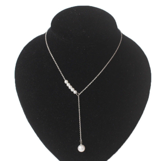 Elegant women's silver fairy pendant necklace, delicate and magical jewelry accessory.