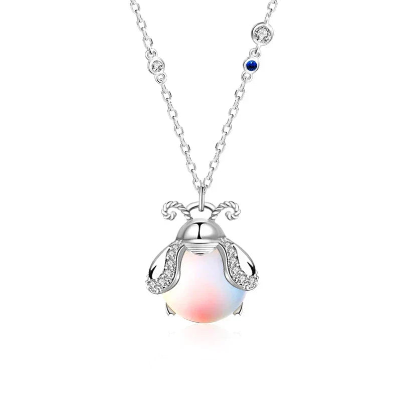 Sterling silver firefly moonstone pendant necklace for women, magical and delicate jewelry.
