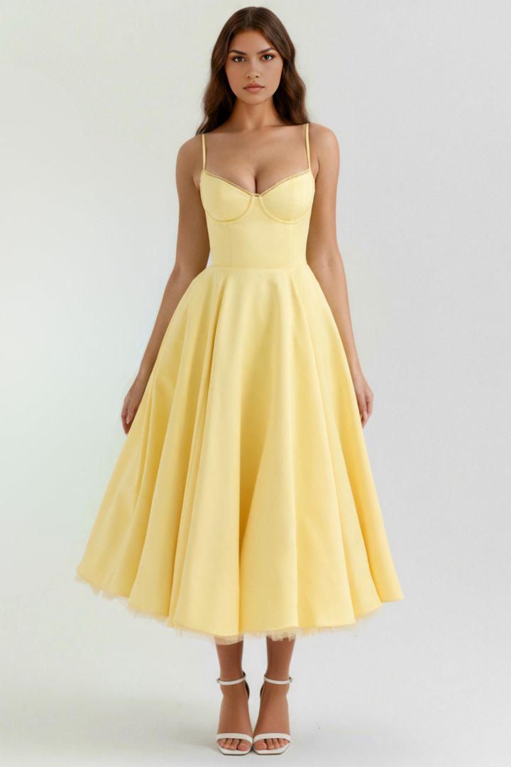 Enchanting Grace midi dress. A stylish women's dress for spring/summer, offering effortless elegance for any event.