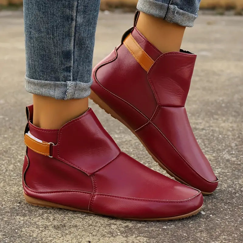 Fashionable ErgoFit ankle boots for women, combining ergonomic comfort with a durable anti-slip sole.