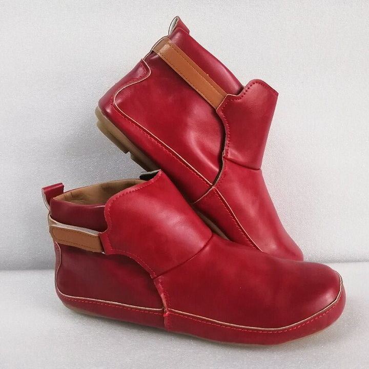 Women's comfortable ErgoFit ankle boots with a sleek profile, great for everyday wear and stylish outfits.