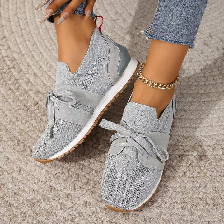 Stylish women's orthopedic walking sneakers with ergonomic design for superior comfort and everyday foot support.