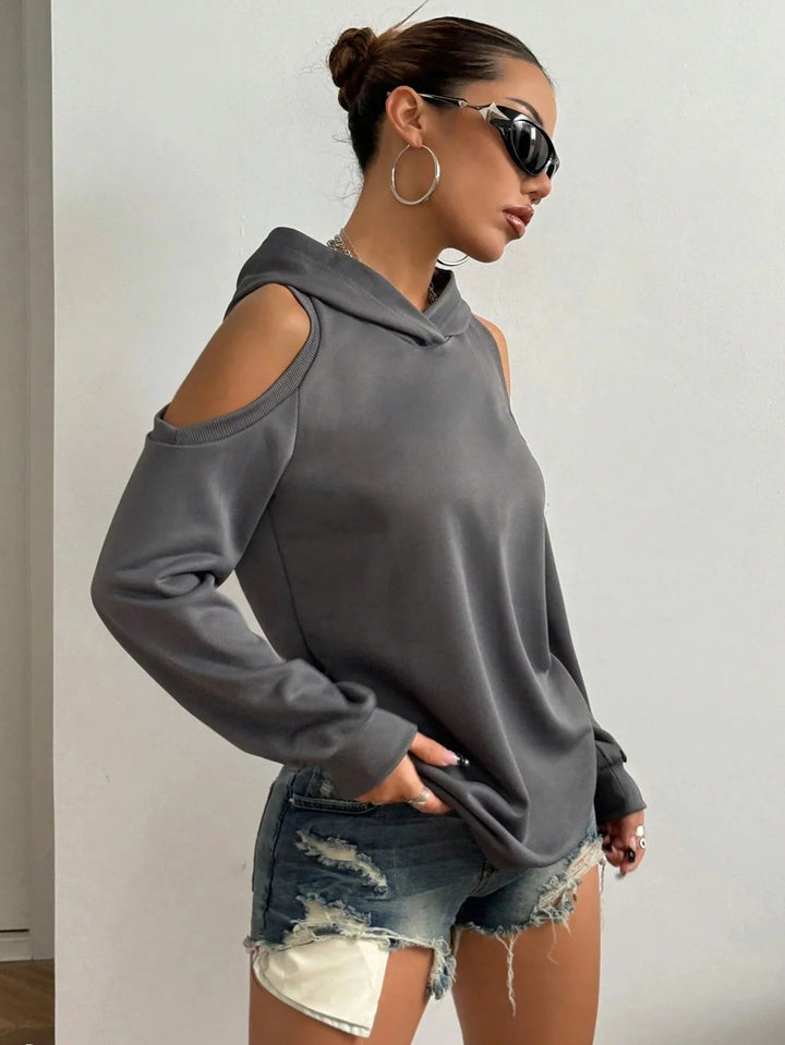 Chic off-shoulder women's hoodie, a modern long sleeve top for relaxed fit and comfortable everyday wear.