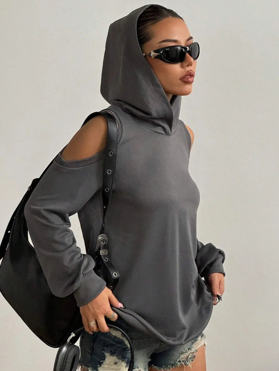 Essentia women's off-shoulder long sleeve hoodie, a versatile casual top for modern fall & spring style.