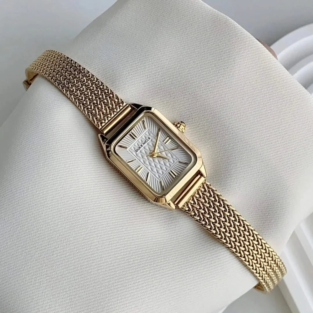 Silver Estella women's minimalist stainless steel wristwatch, elegant & petite for daily wear.