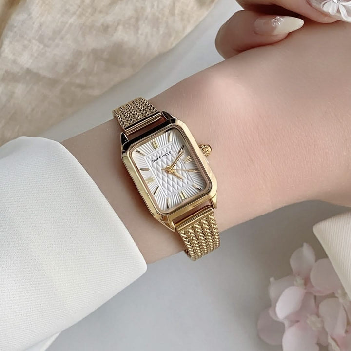 Women's Estella elegant stainless steel wristwatch with black dial, sophisticated fashion accessory.