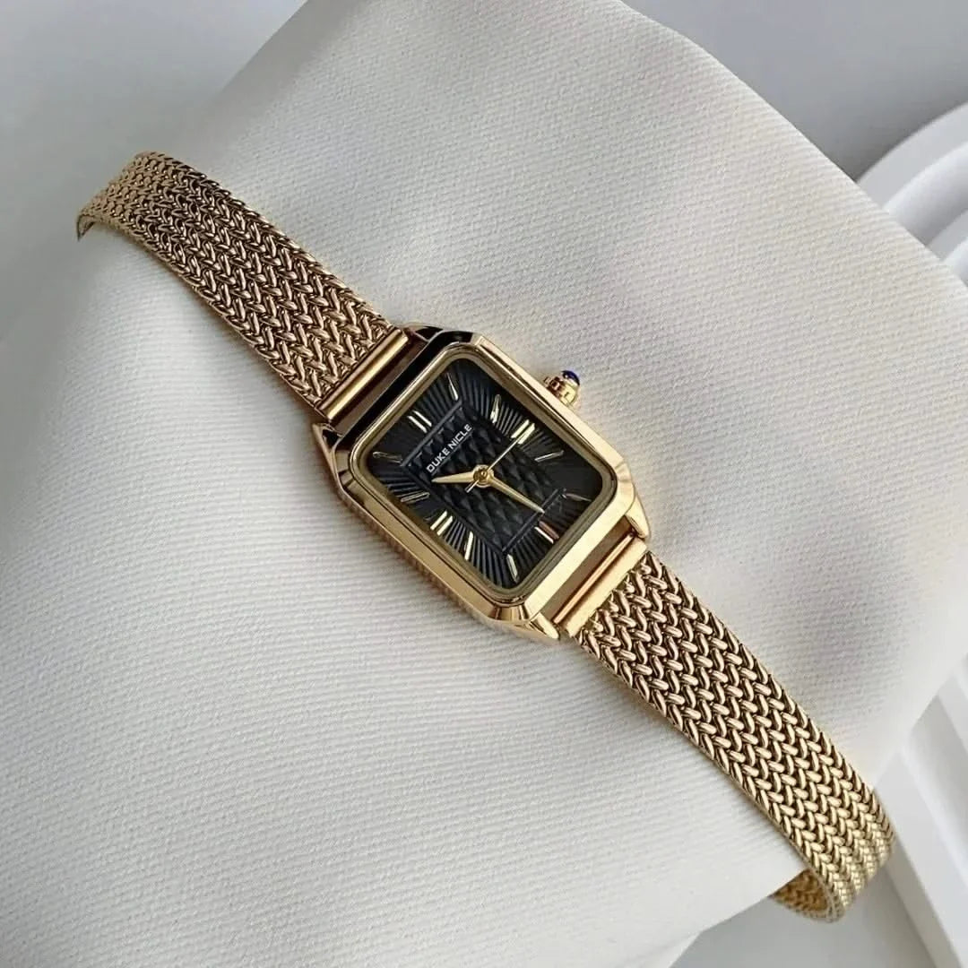 Close-up of Estella women's elegant wristwatch dial, showcasing minimalist and petite design.