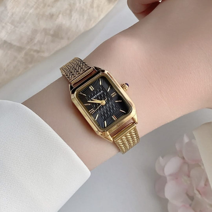Estella women's elegant stainless steel wristwatch worn on a wrist, demonstrating comfortable fit & style.