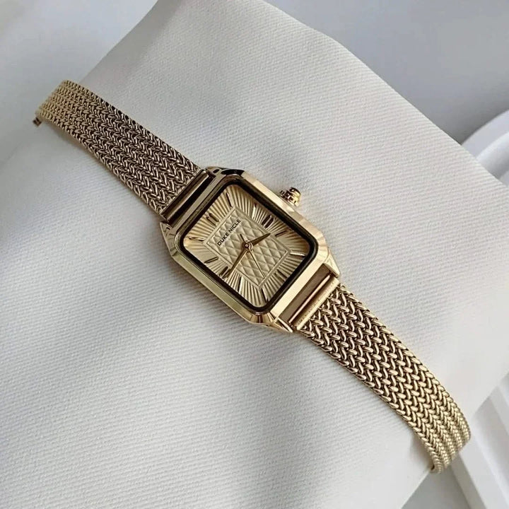 Women's Estella elegant stainless steel wristwatch, a timeless fashion accessory with sleek, petite design.