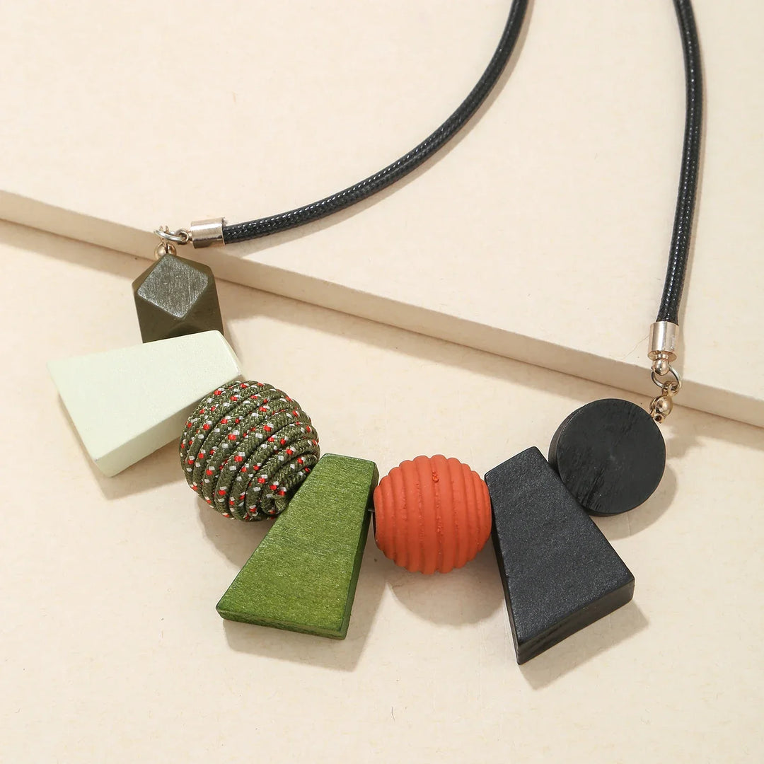 Women's ethnic geometric wooden bead necklace. A handmade natural wood accessory, ideal for boho outfits.