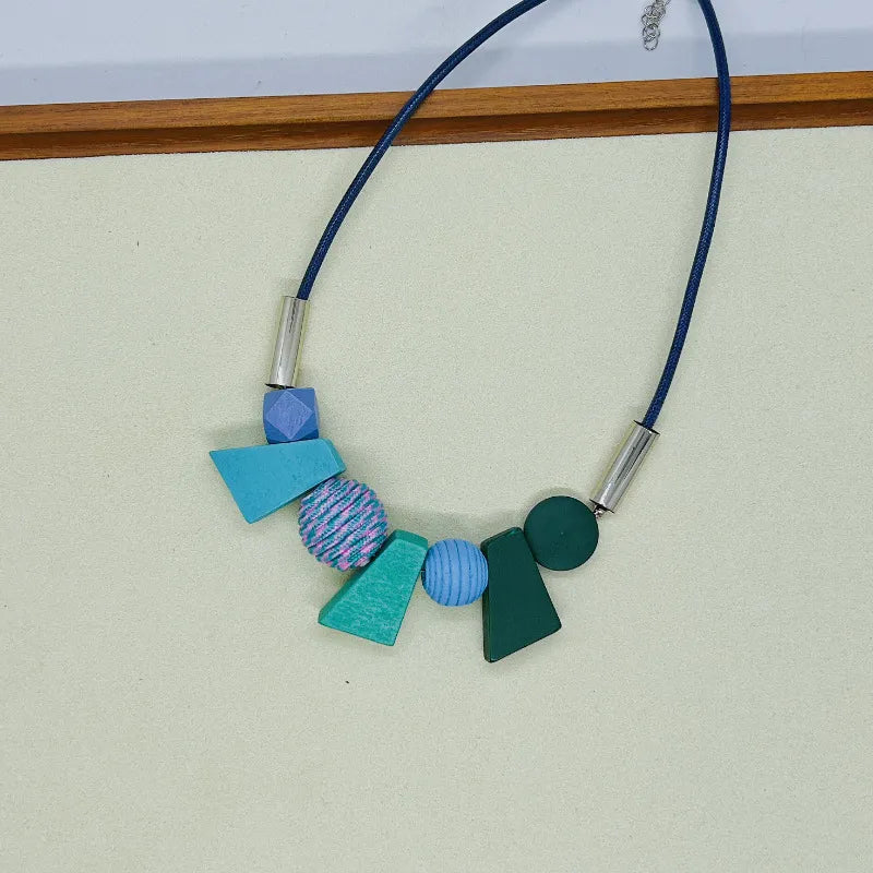 Stylish women's geometric wooden bead necklace. Ethnic handmade jewelry for a natural boho look.